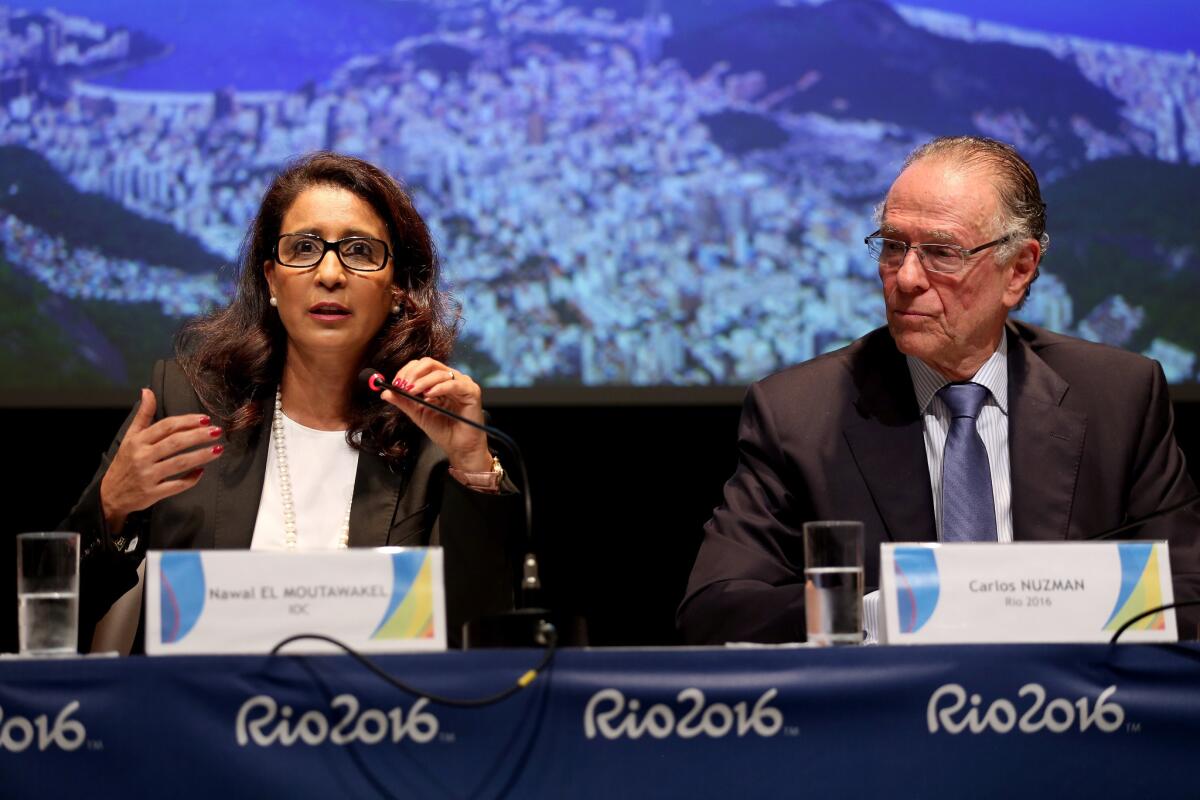 IOC coordination commission chair Nawal El Moutawakel, left, and Rio 2016 organizing committee president Carlos Arthur Nuzman address the media Wednesday in Rio de Janeiro, Brazil.