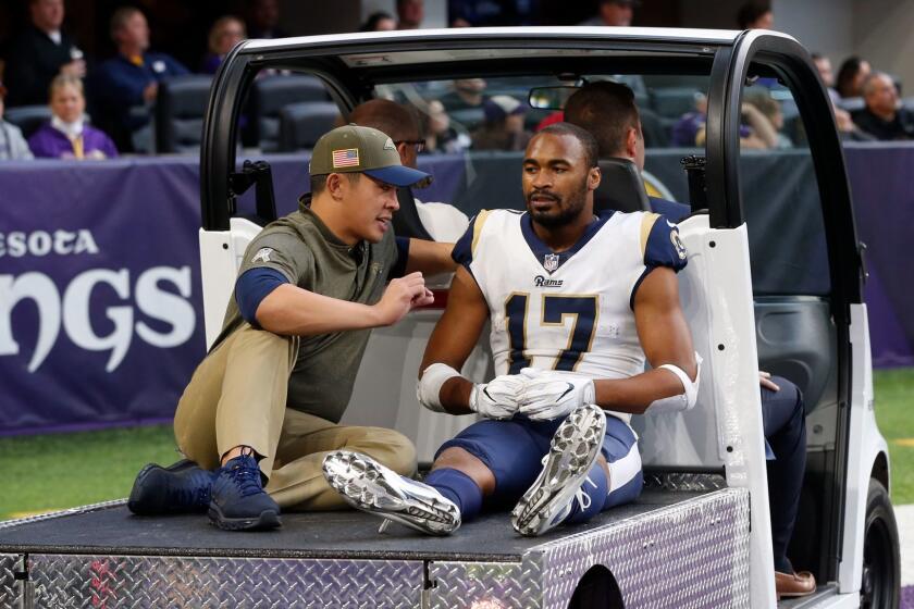Los Angeles Rams wide receiver Robert Woods (17) is carted off the field after getting injured during the second half of an NFL football game against the Minnesota Vikings, Sunday, Nov. 19, 2017, in Minneapolis. The Vikings won 24-7. (AP Photo/Jim Mone)