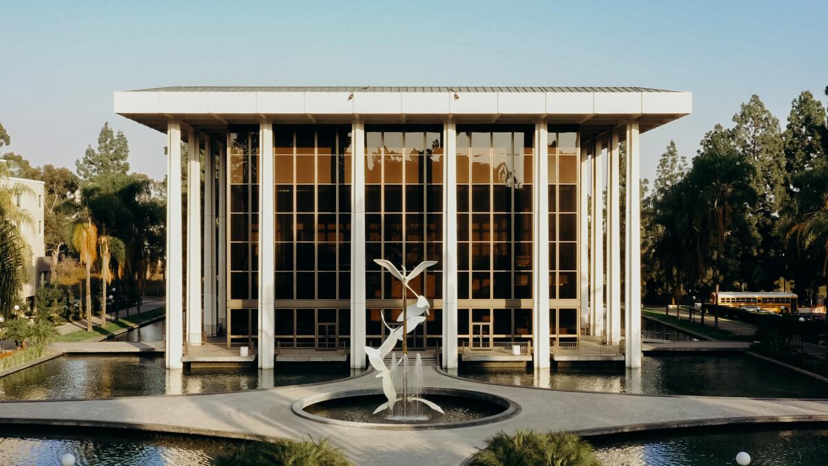 An exterior view of the Ambassador Auditorium and an egret sculpture in Pasadena.