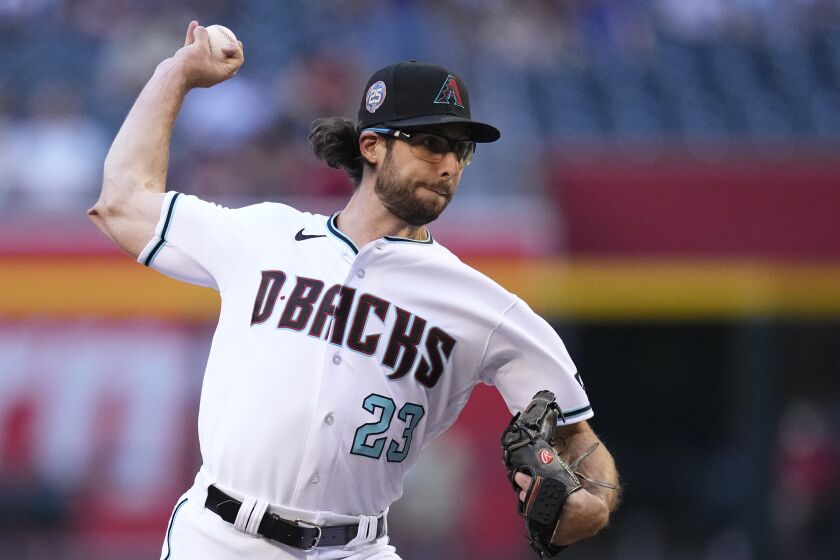 Arizona Diamondbacks starting pitcher Zac Gallen throws against the Colorado Rockies during the first inning of a baseball game Tuesday, May 30, 2023, in Phoenix. (AP Photo/Ross D. Franklin)