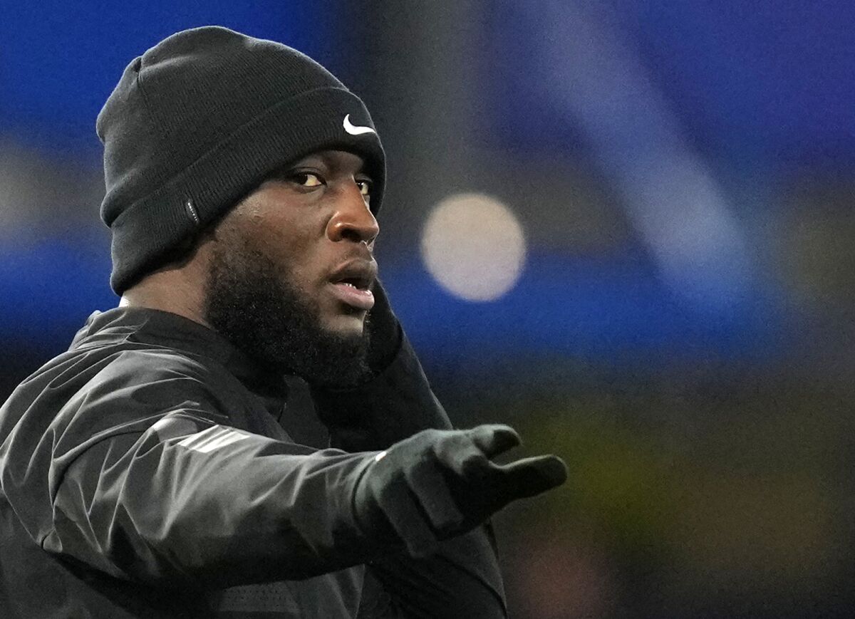 Chelsea's Romelu Lukaku gestures during the warm up before the English League Cup semifinal first leg soccer match between Chelsea and Tottenham Hotspur at Stamford Bridge stadium in London, Wednesday, Jan. 5, 2022. (AP Photo/Kirsty Wigglesworth)