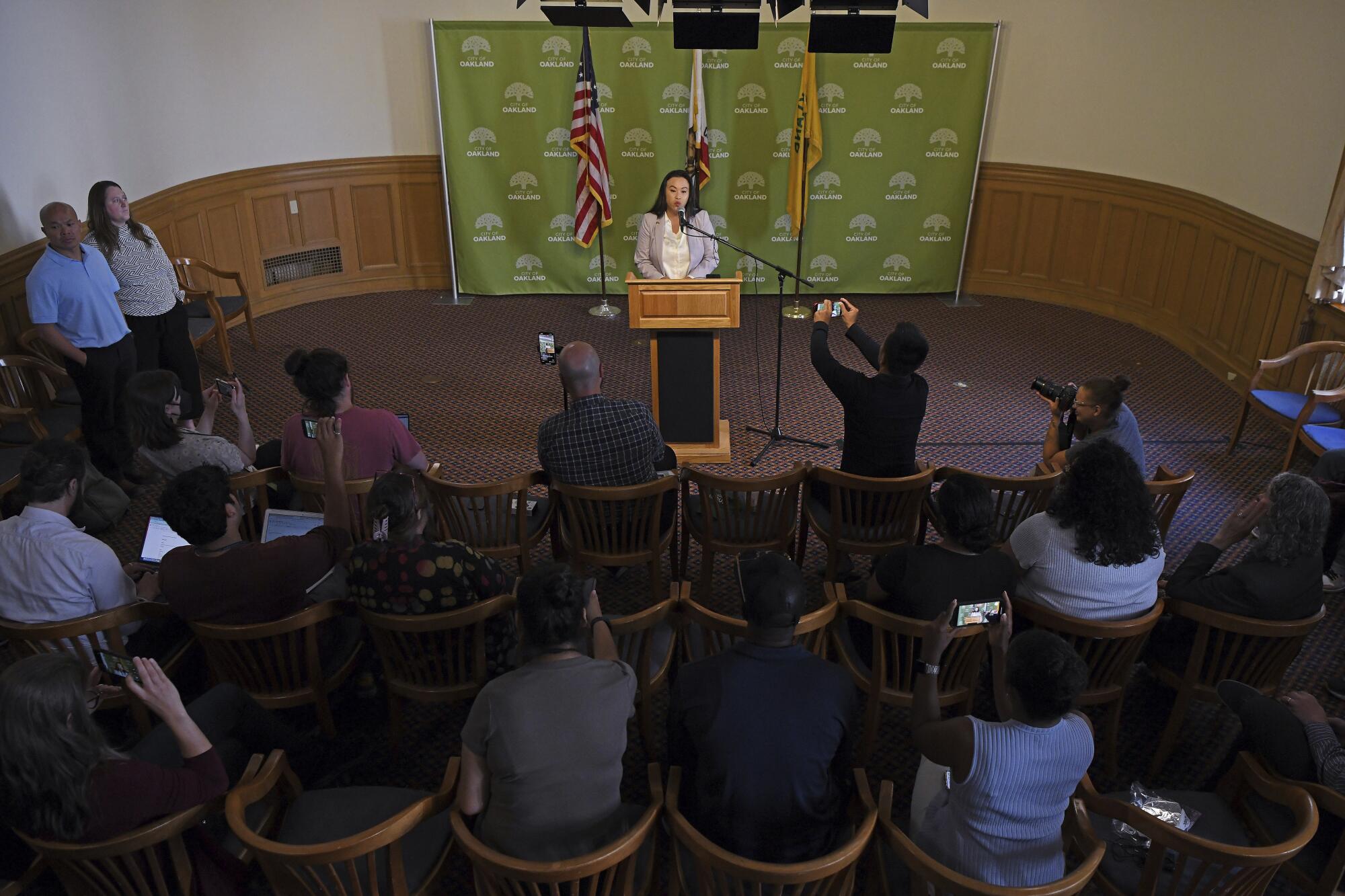 Oakland Mayor Sheng Thao speaks to the media during a press conference at Oakland City Hall. 