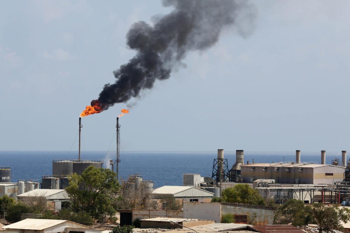 An oil distillery in Zawiya, Libya, in August 2013. Libya's oil-dependent economy has suffered from fighting among militia groups.