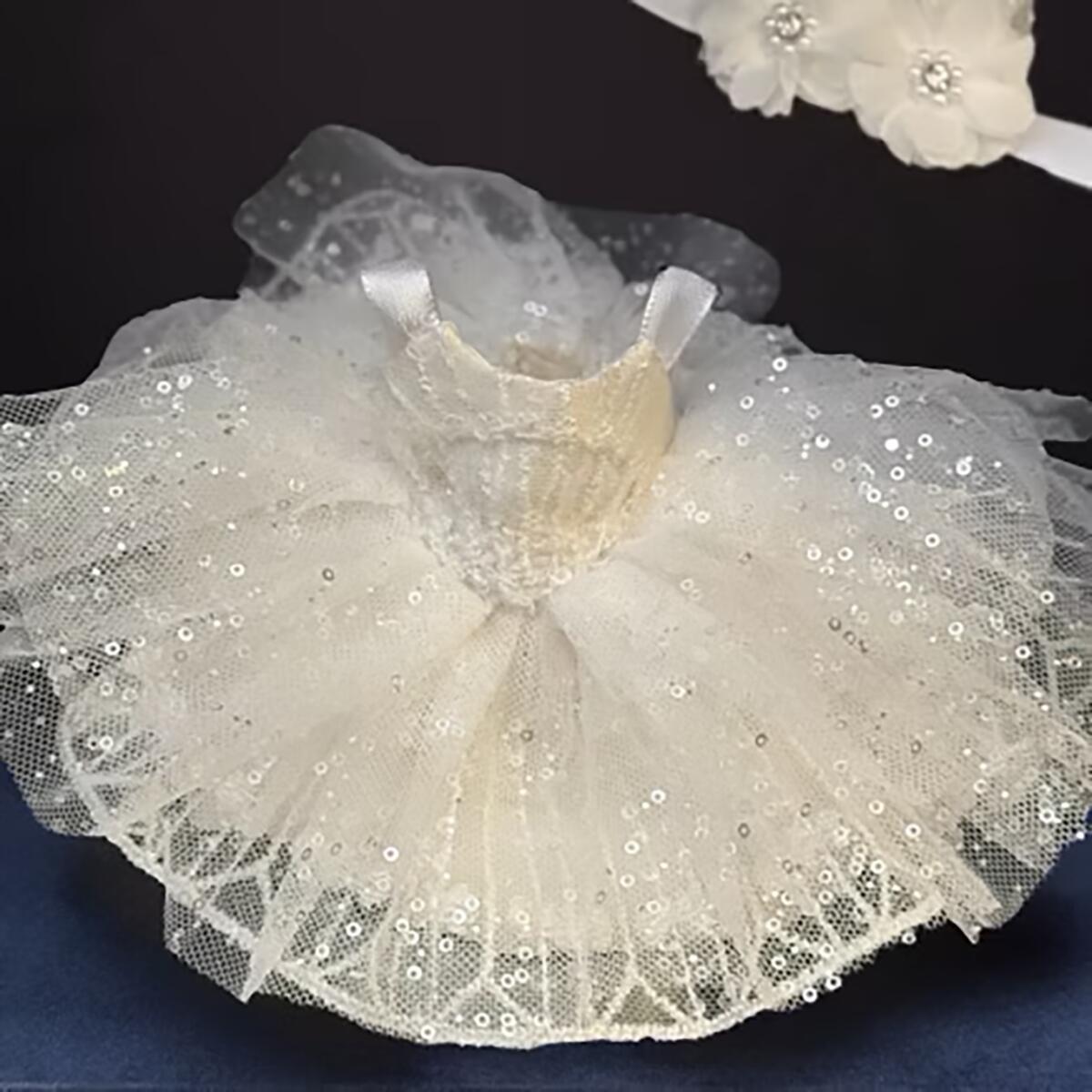 A custom David's Bridal dress made for a Labubu doll.