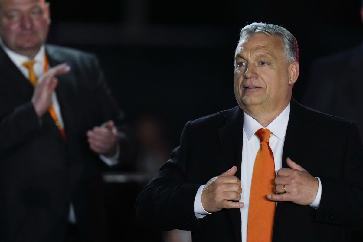 FILE - Hungary's Prime Minister Viktor Orban acknowledges cheering supporters during an election night rally in Budapest, Hungary, on April 3, 2022. The European Union wants to impose a new round of sanctions against Russia over its war in Ukraine, but Hungary has emerged as one of the biggest obstacles to unanimous support needed from the bloc’s 27 member nations. (AP Photo/Petr David Josek, File)