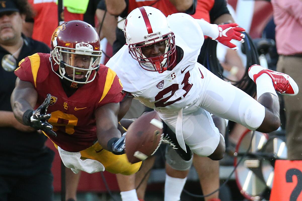 USC receiver JuJu Smith-Schuster and Stanford cornerback Ronnie Harris can't reach an errant pass from Cody Kessler during a Pac-12 Conference game on Sept. 19.