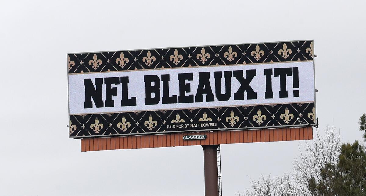 A billboard protesting the NFC championship game's controversial non-call along Interstate 75 near Hartsfield Jackson Atlanta International Airport in January.