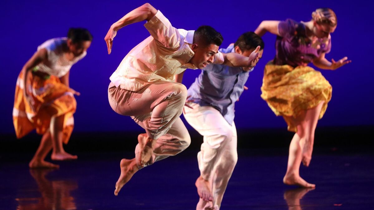 Dancers from the UCI Etude Ensemble perform Donald McKayle's "Uprooted: Pero Replantado," whose title translates to "Uprooted: But Replanted."