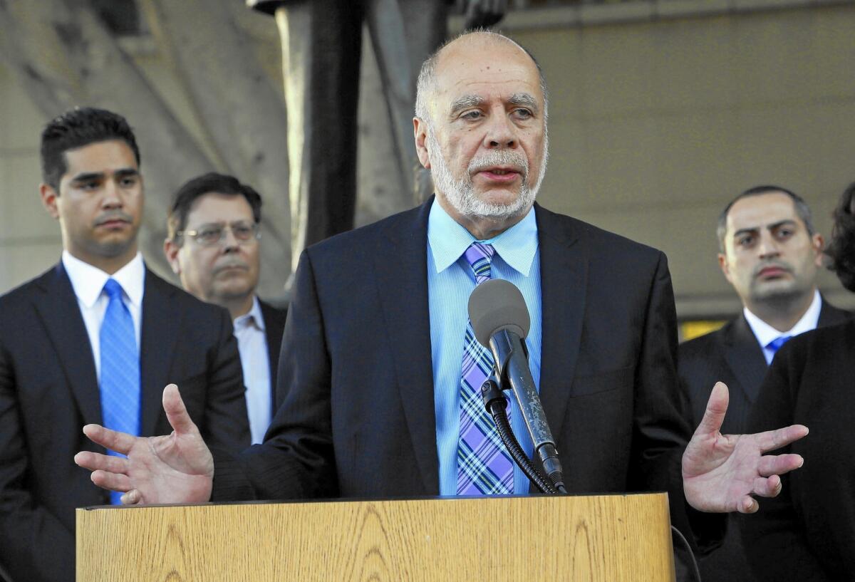 Attorney Luis Carrillo, who represented claimants against L.A. Unified in the Miramonte Elementary School case, talks to reporters after the $139-million settlement was reached.