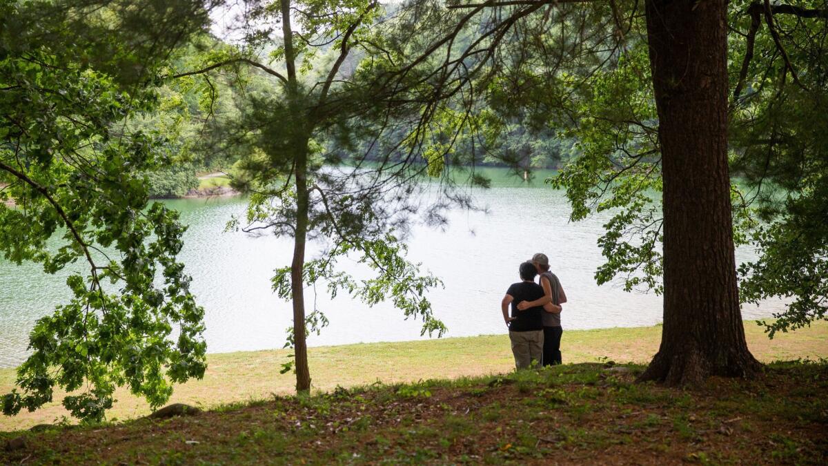 Wendy Matney and husband Steve enjoy a quiet moment. "I’m being charged an incredible amount of money just to live. It somehow doesn’t feel fair," she said.