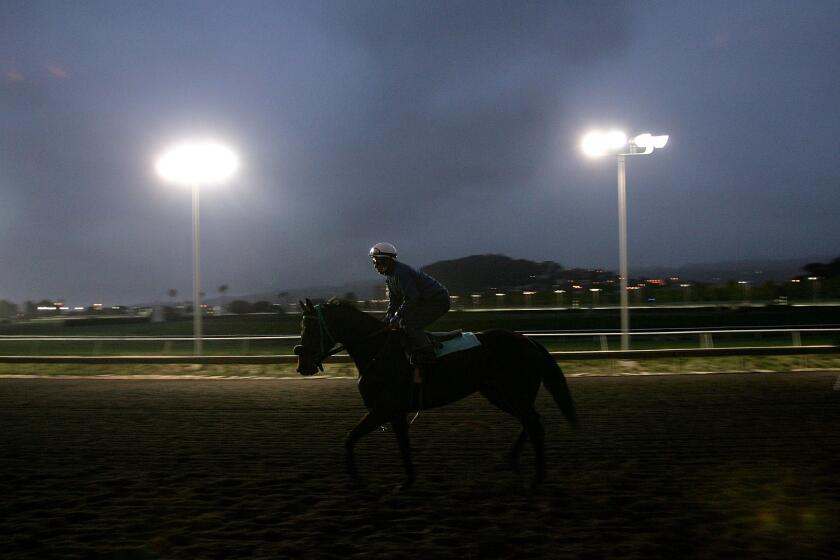ALBANY, CA - APRIL 28: Apprentice Jockey Martin Garcia of Mexico runs a horse on the track during morning workouts at Golden Gate Fields April 28, 2006 in Albany, California. Garcia, 21, came to the United States from Veracruz, Mexico three years ago in search of work. He landed a job as a cook at a deli in Pleasanton, California. After he had been on the job for a while, Garcia found out that the restaurant owner had a horse and asked if he could ride it sometime. Garcia?s natural talent of handling the horse was noticed and he was introduced to a trainer at the local fairground racetrack. Garcia got a job working out horses and was immediately recognized for his riding abilities and asked if he would like to become a jockey. In 2005 Garcia began racing and winning. He is now the second winning jockey in the country. Despite making the average of $10,000 per week, he still works at the deli two nights a week. (Photo by Justin Sullivan/Getty Images)