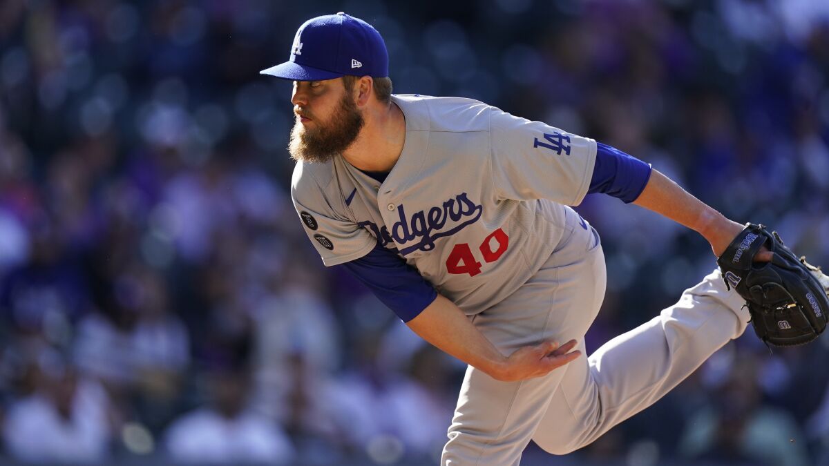 Dodgers reliever Jimmy Nelson delivers against the Colorado Rockies in April 2021.