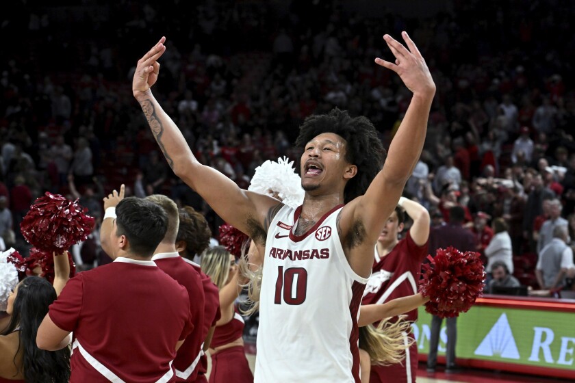 Arkansas forward Jaylin Williams celebrates the team's win over Mississippi State in an NCAA college basketball game Saturday, Feb. 5, 2022, in Fayetteville, Ark. (AP Photo/Michael Woods)