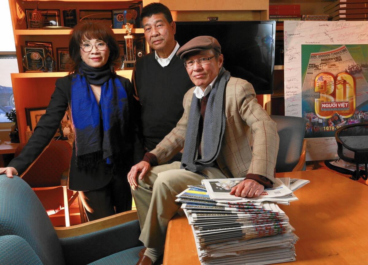 Vinh "Vicky" Hoang, left, Thai Dinh, center and Dat Phan of Nguoi Viet at the paper's offices in Westminster.