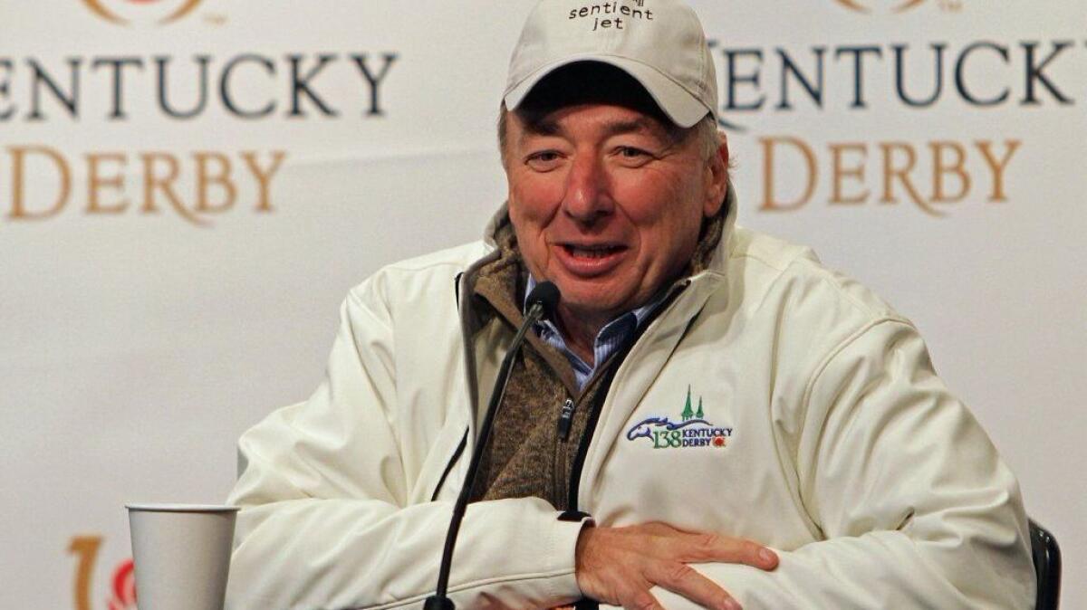 J. Paul Reddam and his Orange County company CashCall have been ordered to pay $10.3 million for violating federal consumer protection laws. Above, Reddam, who owns race horses, speaks at a news conference before the 2016 Kentucky Derby.
