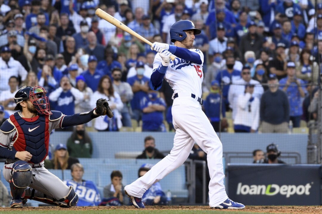 Los Angeles Dodgers' Cody Bellinger follows through on a swing.
