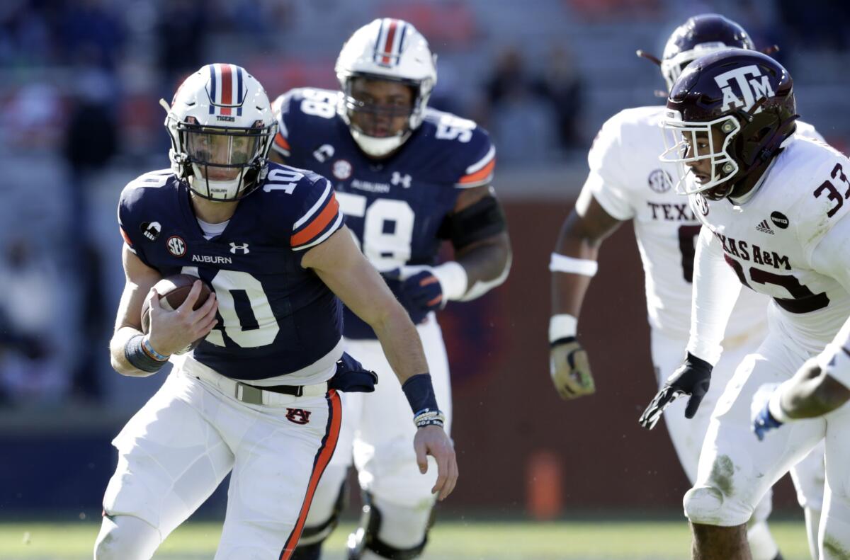 Auburn quarterback Bo Nix scrambles for yardage during the second half against Texas A&M.