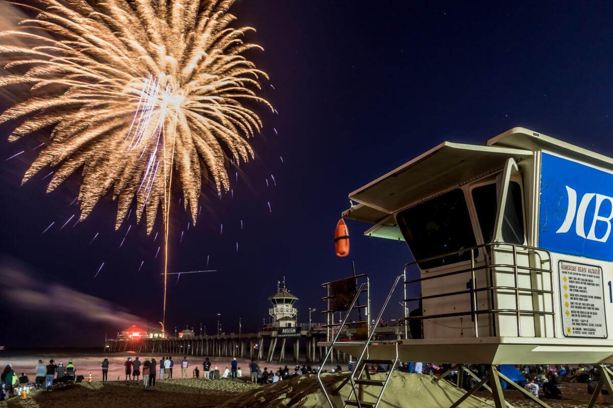 Fireworks over Huntington Beach Pier.