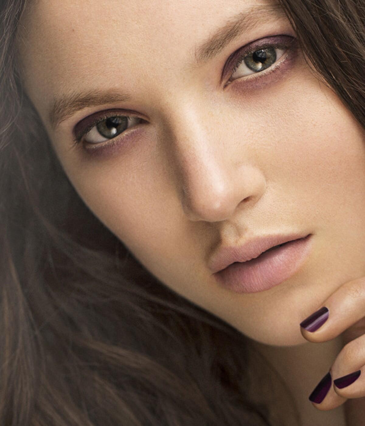 Burberry Make-Up fall 2014 advertising campaign image, featuring British model Matilda Lowther.