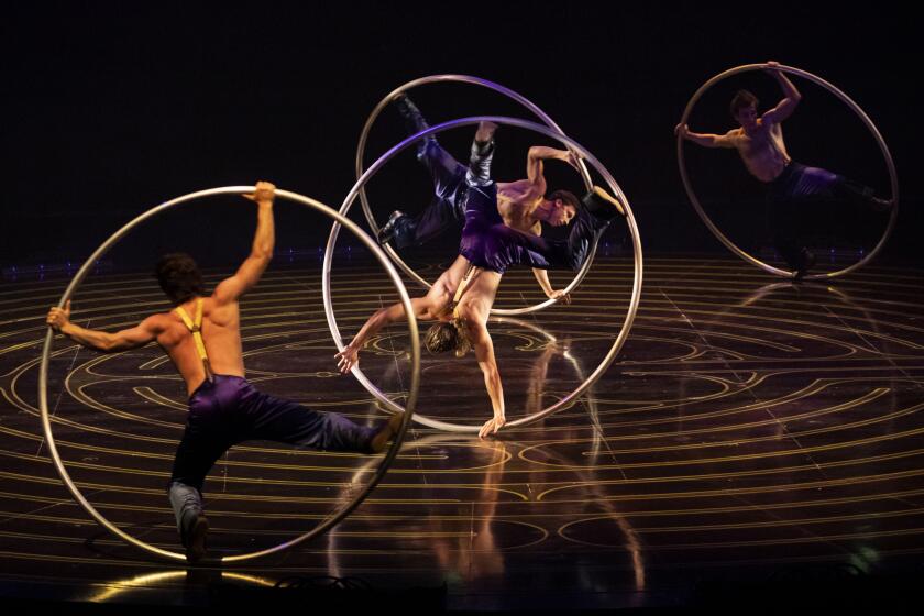 The act "Cyr Wheel" from Cirque du Soleil's production of "Corteo."