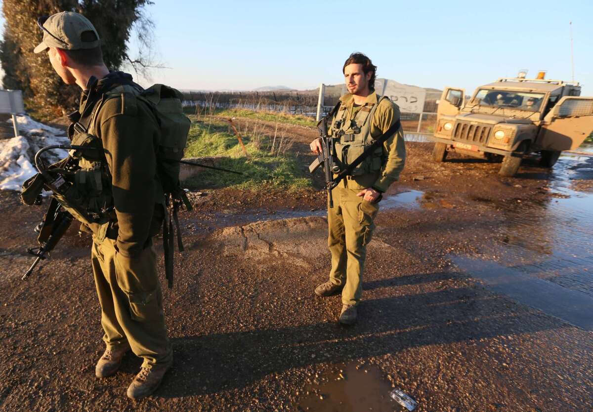 Israeli troops patrol the Israeli-occupied sector of the Golan Heights on Sunday.