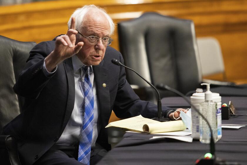 Sen. Bernie Sanders, D-Vt., questions former Gov. Jennifer Granholm, D-Mich., as she testifies before the Senate Energy and Natural Resources Committee during a hearing to examine her nomination to be Secretary of Energy, Wednesday, Jan. 27, 2021 on Capitol Hill in Washington. (Graeme Jennings/Pool via AP)