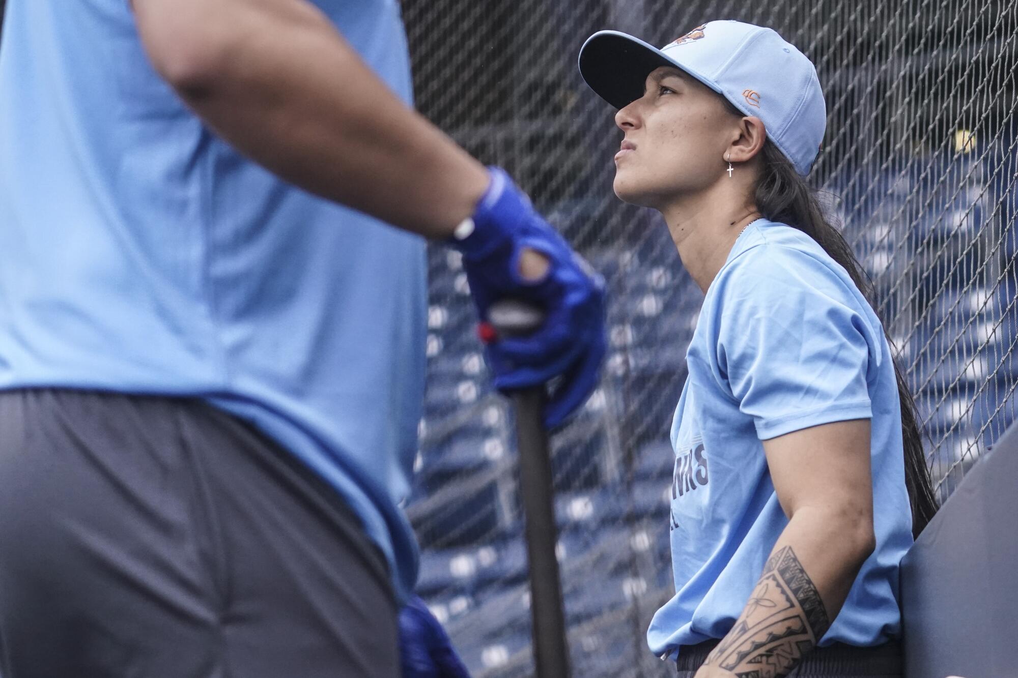 Kelsie Whitmore, a two-way player for the Atlantic League's Staten Island FerryHawks, waits to warm up in the batting cage