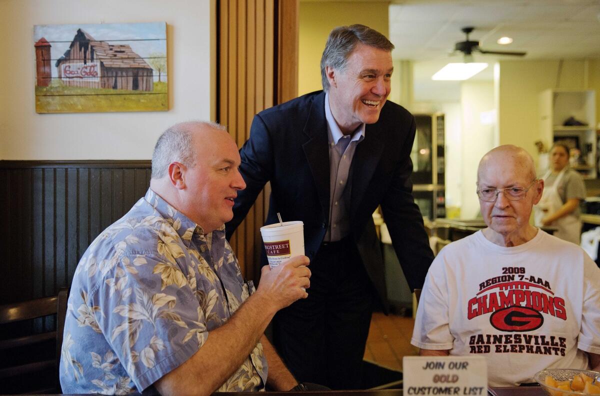 Georgia Republican Senate candidate David Perdue talks with voters during a campaign stop at Longstreet Cafe ahead of the state's May 20 primary election. (AP Photo/David Goldman)