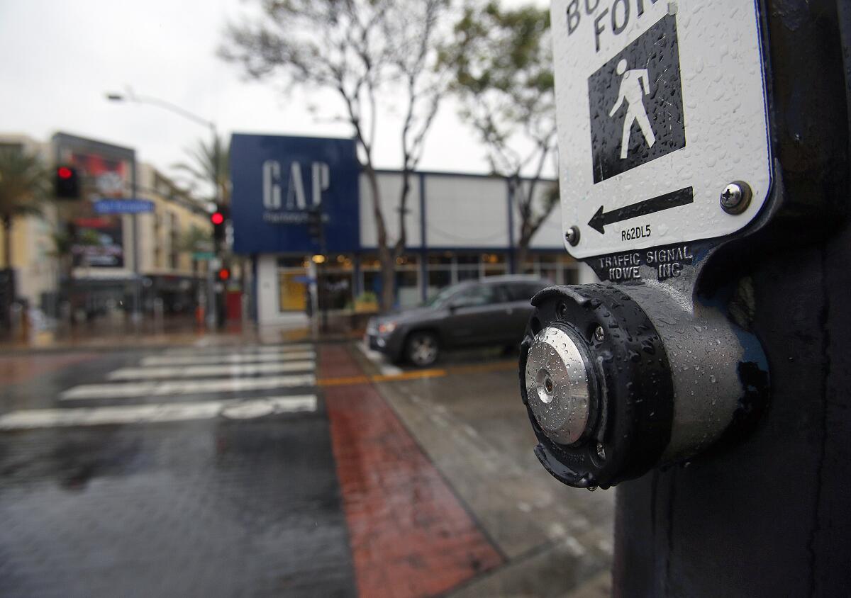 Burbank has automated the walk signal at traffic intersections in the city to cut down the need for pedestrians to press a button as a way to slow the spread of the novel coronavirus. Pictured is the crosswalk at San Fernando Boulevard and Palm Avenue on April 9, 2020.