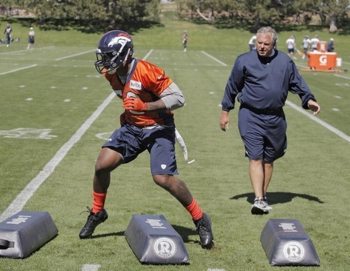 Von Miller works out at Broncos' camp earlier this season.