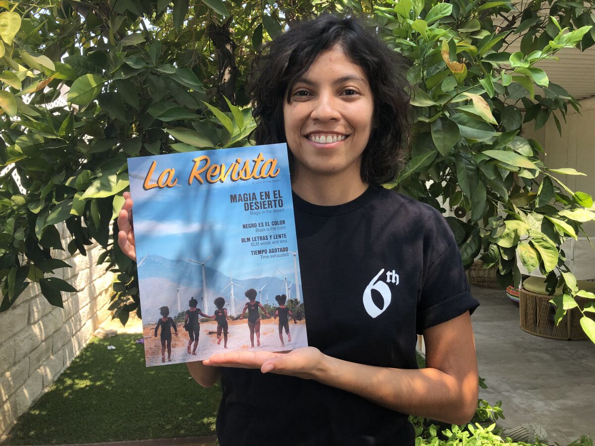Ivette Zamora Cruz with a copy of La Revista, her Spanish-language magazine that covers Latinos in the Coachella Valley.