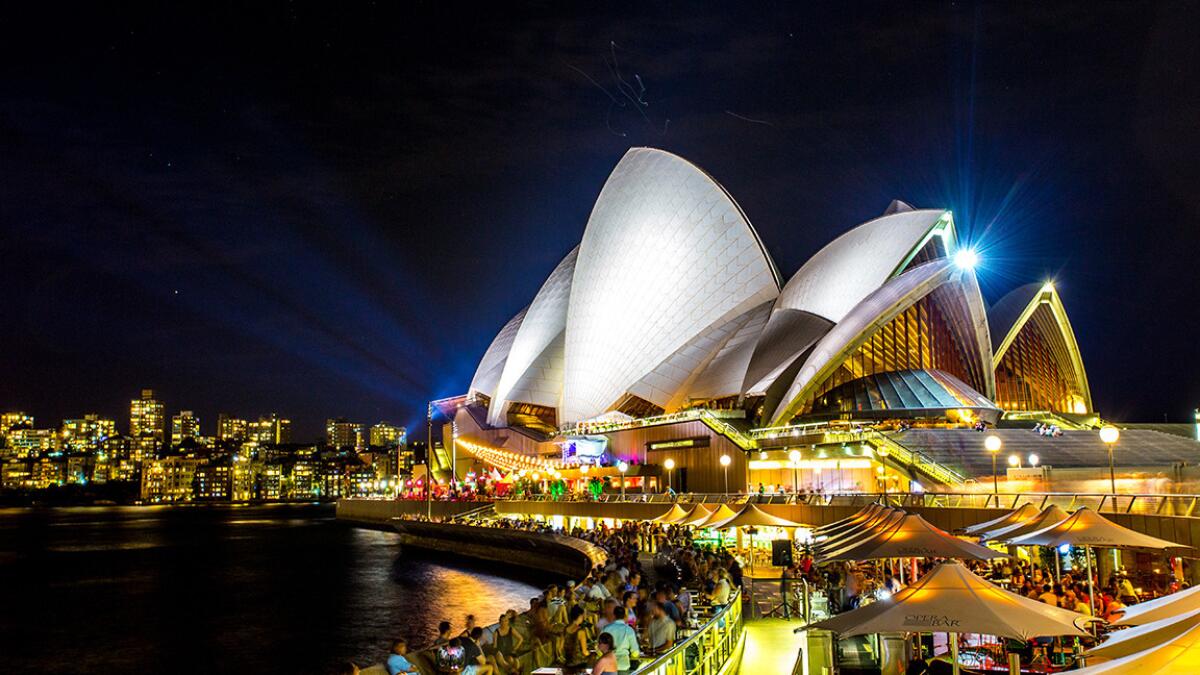 Sydney's iconic opera house lights up the landscape. Qantas has round-trip fares to Sydney or Melbourne for $929.