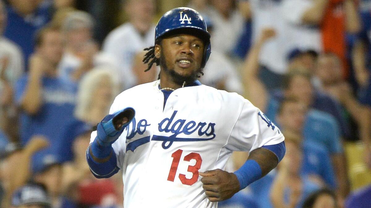 Dodgers shortstop Hanley Ramirez scores a run against the Miami Marlins in May.