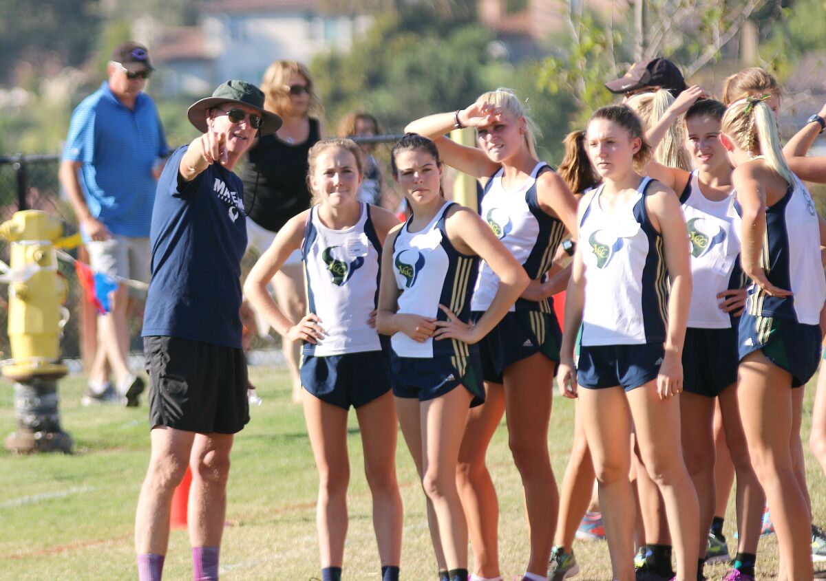 Vice gives his 2018 girls team (that went on to win a CIF championship) pre-race instructions.