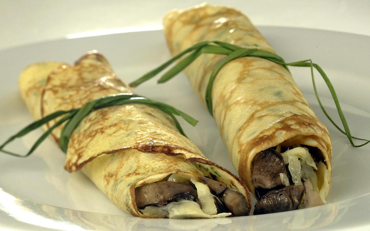 Wild mushroom crepes with cheese and chives