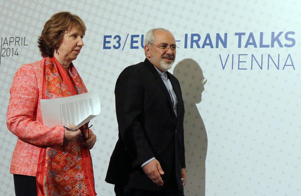 European Union foreign policy chief Catherine Ashton and Iranian Foreign Minister Mohammad Javad Zarif arrive to address the media after closed-door nuclear talks in Vienna this week.