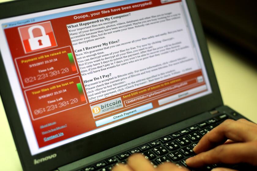 epa05960674 A programer shows a sample of a ransomware cyberattack on a laptop in Taipei, Taiwan, 13 May, 2017. According to news reports, a 'WannaCry' ransomware cyber attack hits thousands of computers in 99 countries encrypting files from affected computer units and demanding 300 US dollars through bitcoin to decrypt the files. EPA/RITCHIE B. TONGO ** Usable by LA, CT and MoD ONLY **