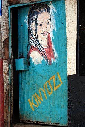 A painting adorns a door in Kibera, in Nairobi, Kenya. In Africa's biggest slum, the residents who choose art as their livelihood face a tough road.