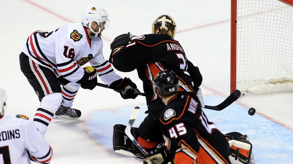 Chicago Blackhawks center Marcus Kruger scores the winning goal past Ducks goalie Frederik Andersen in triple overtime of a 3-2 victory in Game 2 of the Western Conference finals at Honda Center on May 19.