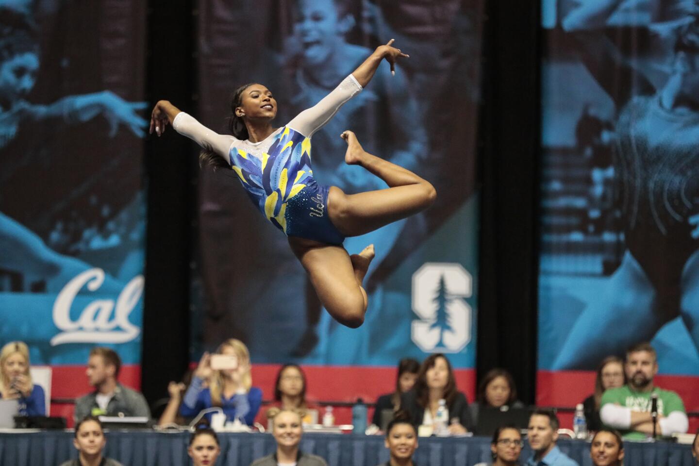 Nia Dennis competes for the Bruins in the floor competition at the Collegiate Challenge meet.
