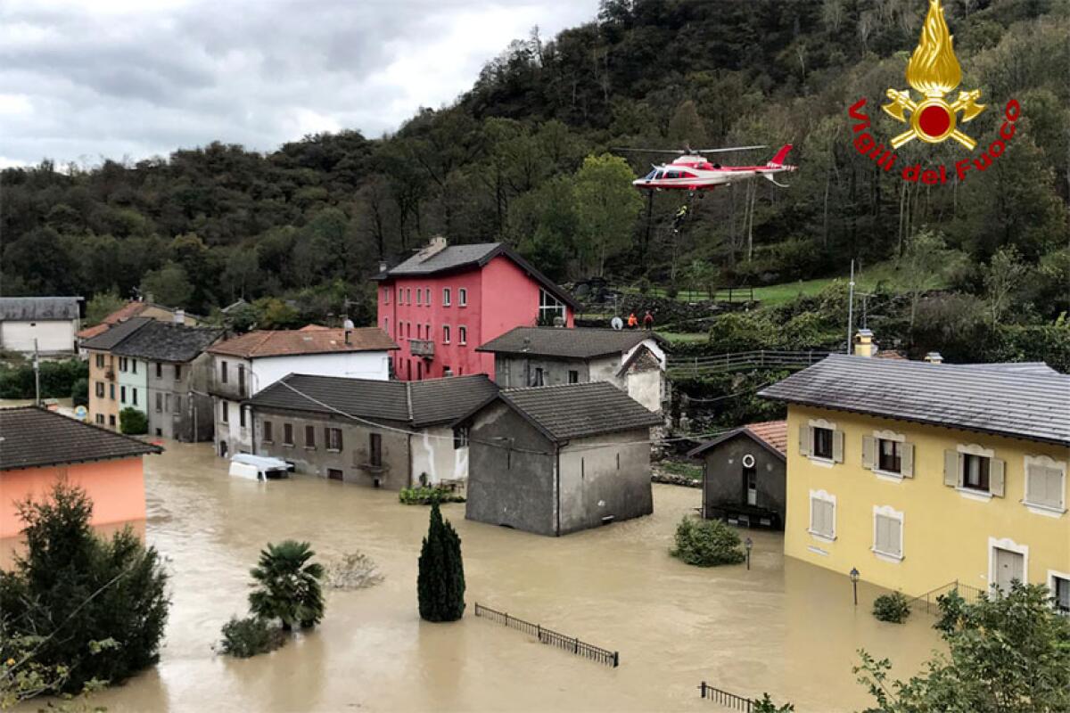 A rescue helicopter in the flooded Italian region of Piedmont on Sunday.