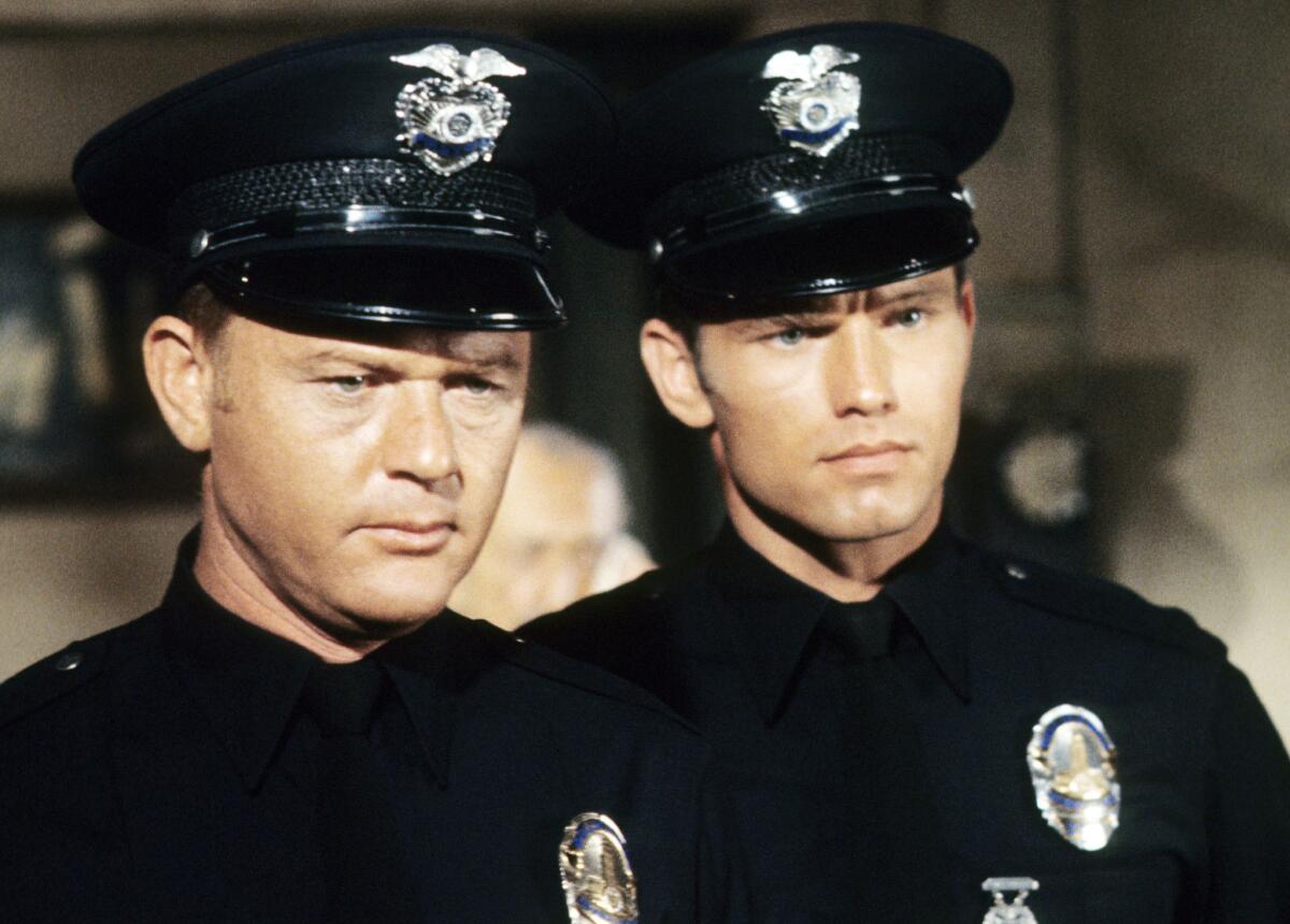 Martin Milner, left, as Officer Pete Malloy and Kent McCord as Officer Jim Reed in "Adam-12."