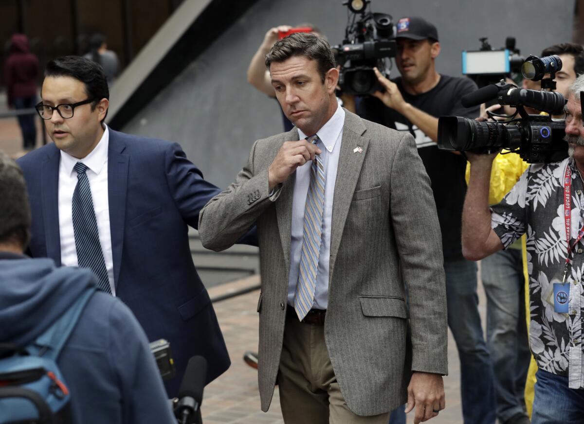Rep. Duncan Hunter (R-Alpine) leaves court in September. He and his wife pleaded not guilty to charges of misusing campaign funds.
