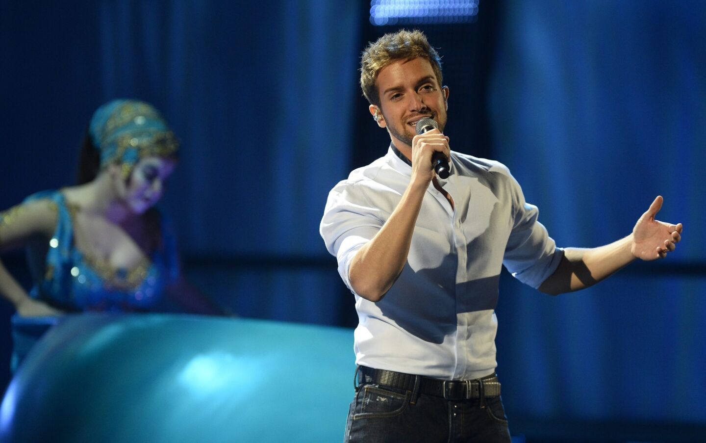 Spanish singer, Pablo Alboran sings to the audience.