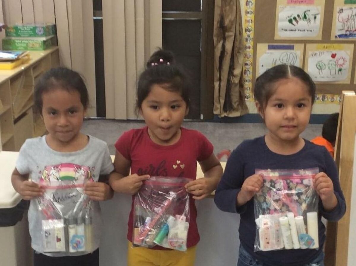 Andrea, Angela and April with Hygiene Kits they received from Assistance League San Dieguito.
