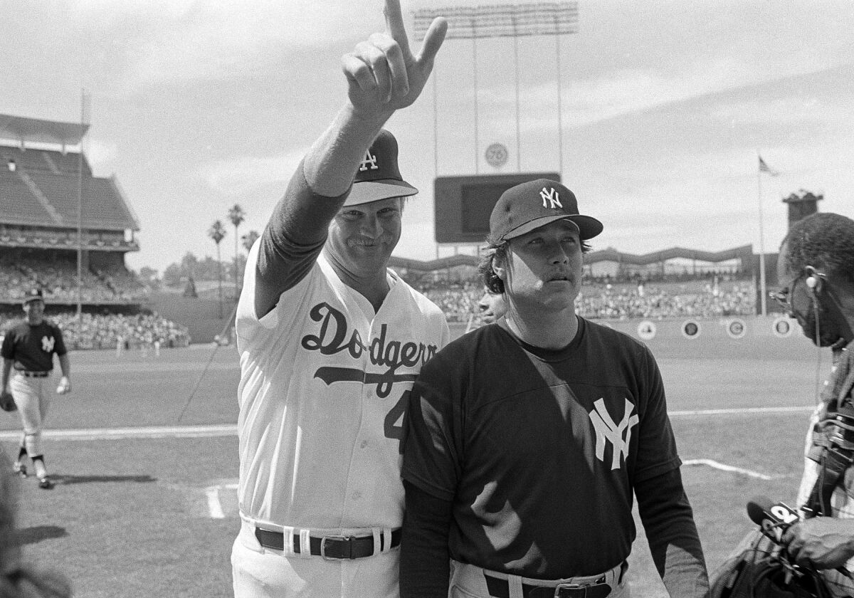Dodgers pitcher Jerry Reuss stands with the Yankees' Goose Gossage at the 1980 All-Star game at Dodger Stadium.