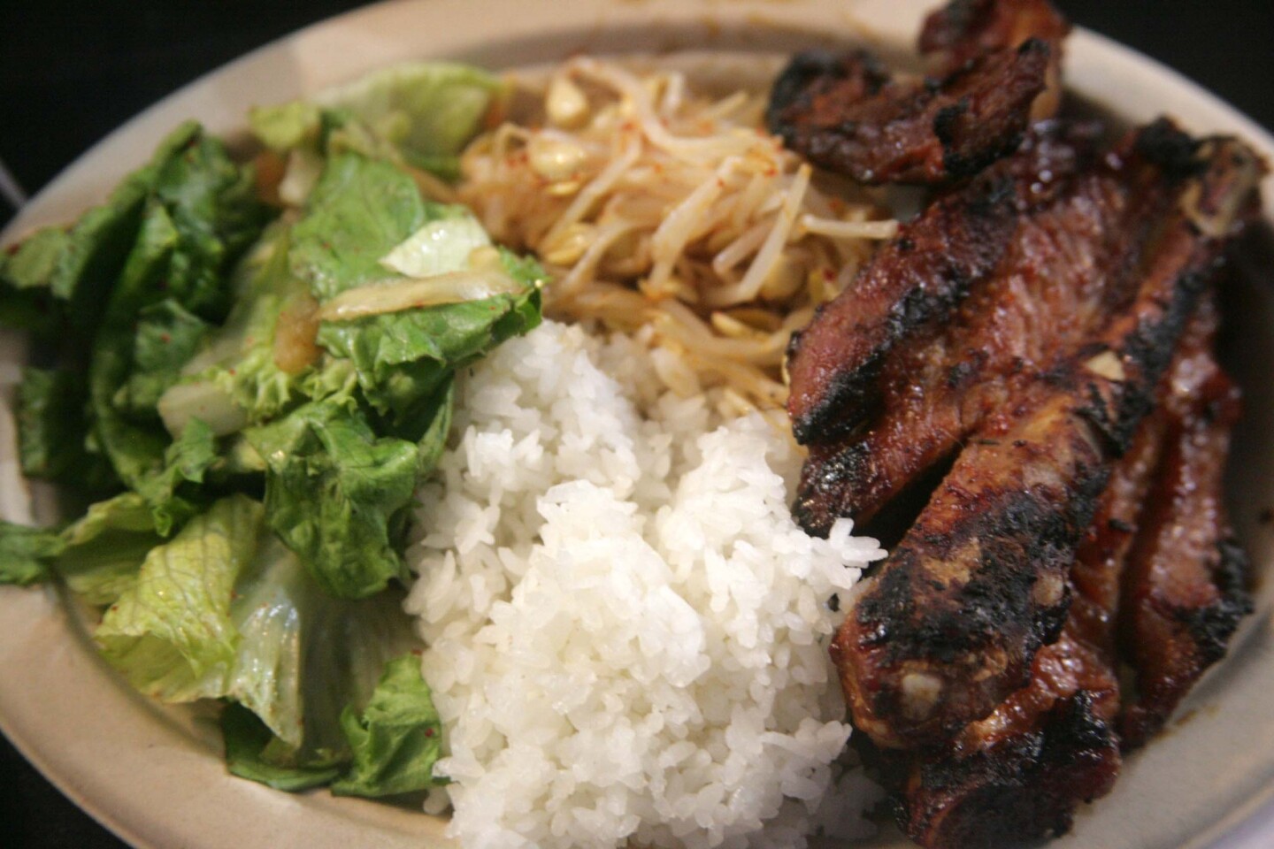 Char-grilled pork ribs, rice, salad and bean sprouts from Hamjipark.