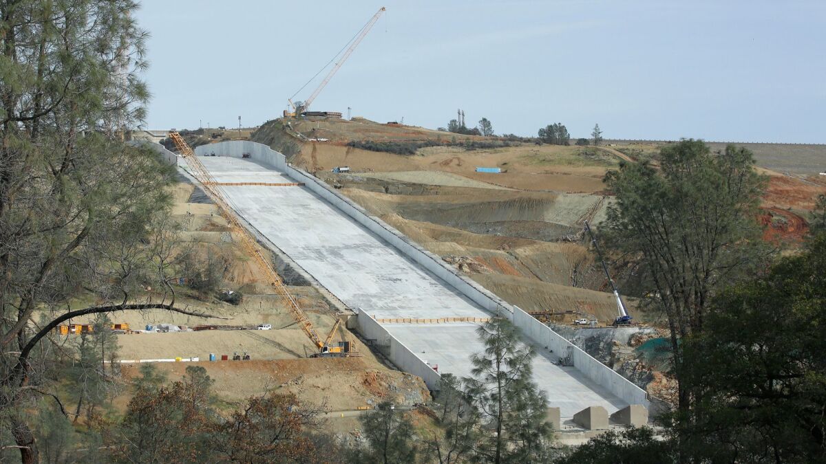 The Oroville Dam spillway could get its first test soon after a storm drops several inches of rain in Northern California.