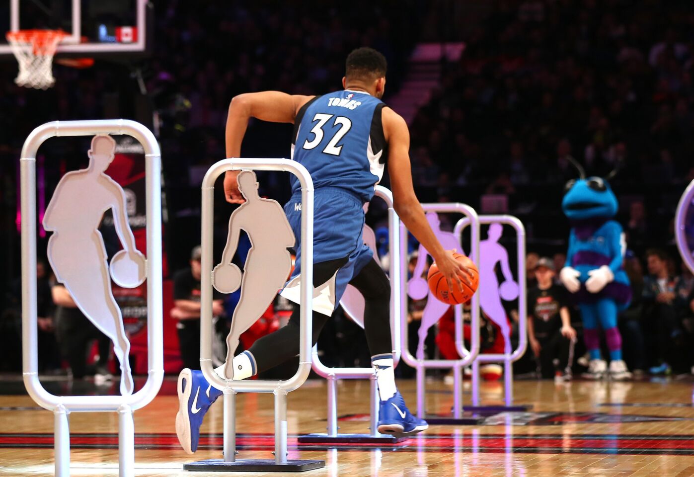Minnesota forward Karl-Anthony Towns weaves his way through the Skills Challenge course on Saturday.