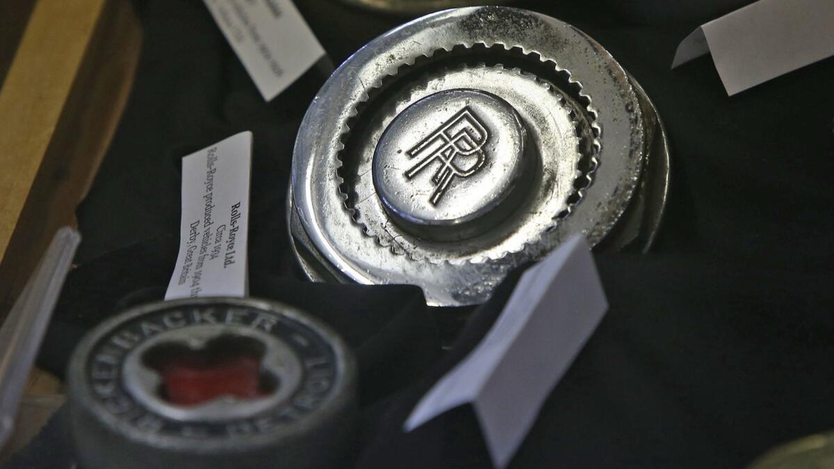 A hubcap from a 1934 Rolls-Royce is part of Dennis Mitosinka’s vintage collection on display at the Orange County Fair.